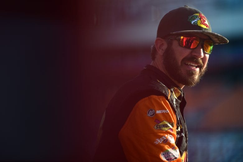 CHARLOTTE, NORTH CAROLINA - MAY 23: Martin Truex Jr., driver of the #19 Bass Pro Shops/TRACKER/USO Toyota, stands on the grid during qualifying for the Monster Energy NASCAR Cup Series Race Coca-Cola 600 at Charlotte Motor Speedway on May 23, 2019 in Charlotte, North Carolina.  (Photo by Jared C. Tilton/Getty Images) | Getty Images
