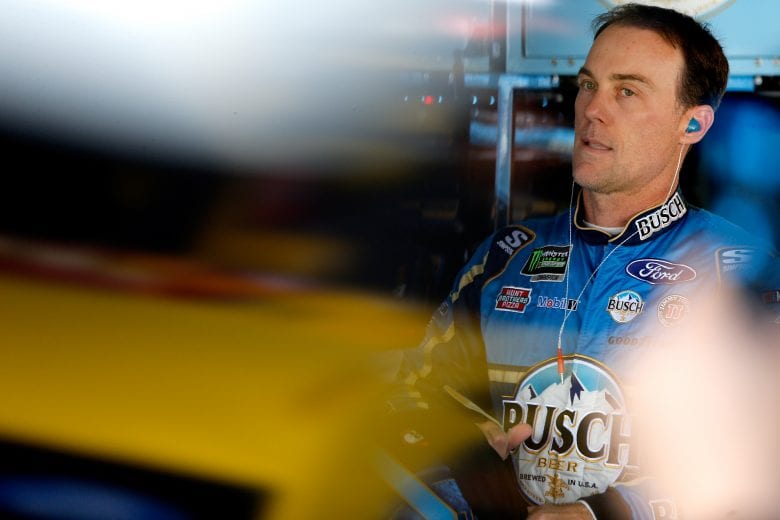 KANSAS CITY, KS - MAY 10:  Kevin Harvick, driver of the #4 Busch Beer Ford, stands in the garage during practice for the Monster Energy NASCAR Cup Series Digital Ally 400 at Kansas Speedway on May 10, 2019 in Kansas City, Kansas.  (Photo by Brian Lawdermilk/Getty Images) | Getty Images