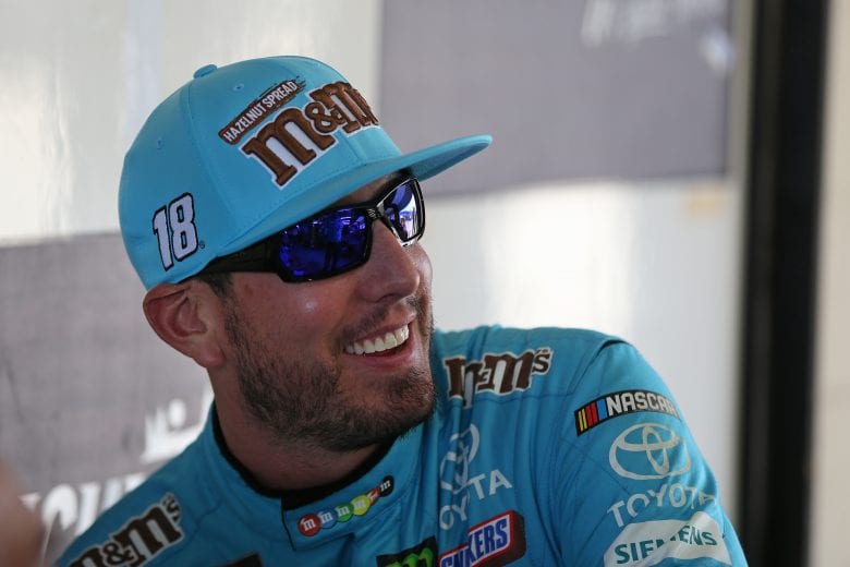 BROOKLYN, MICHIGAN - JUNE 07: Kyle Busch, driver of the #18 M&M's Hazelnut Toyota, stands by his car during practice for the Monster Energy NASCAR Cup Series FireKeepers Casino 400 at Michigan International Speedway on June 07, 2019 in Brooklyn, Michigan. (Photo by Matt Sullivan/Getty Images) | Getty Images