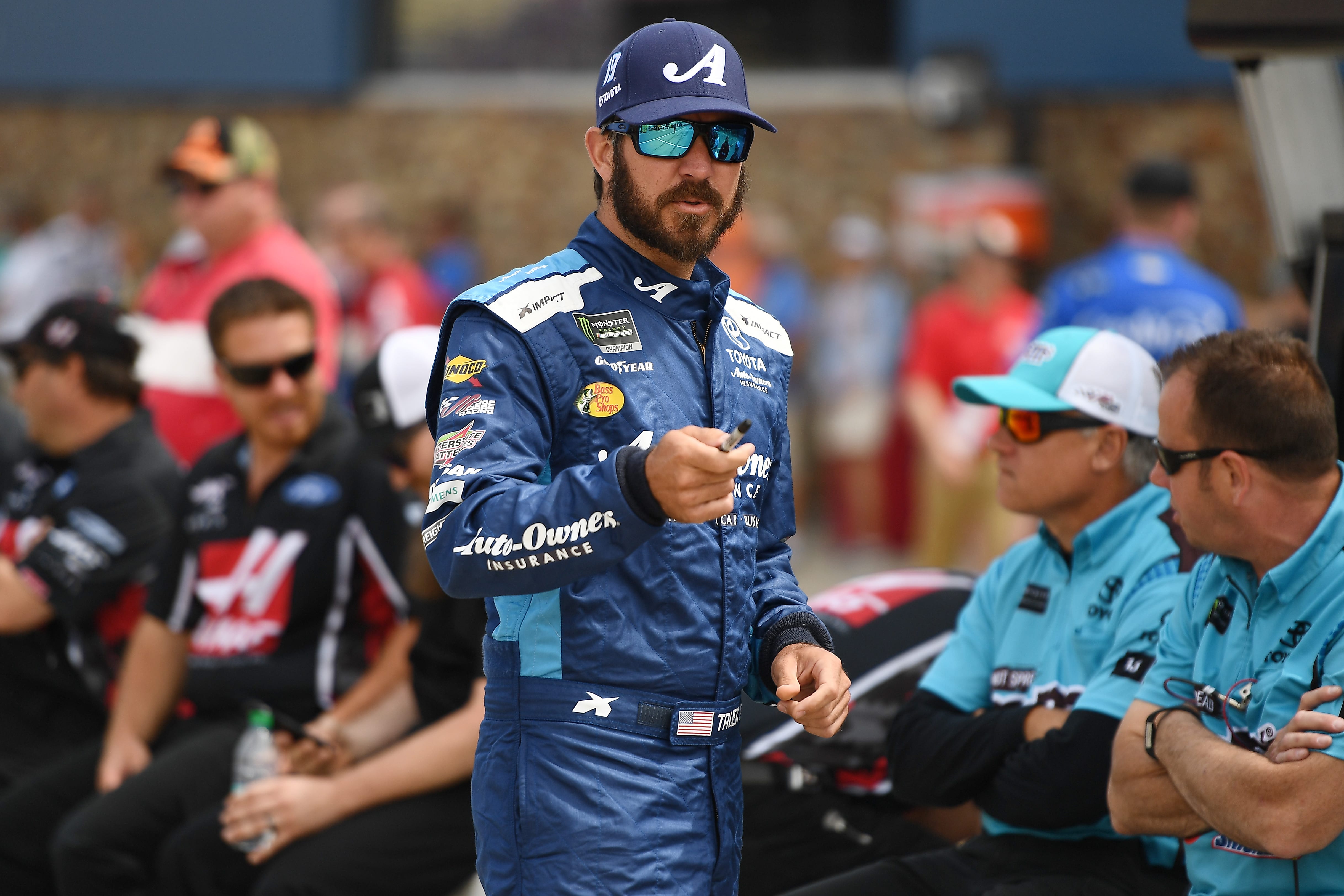 BROOKLYN, MICHIGAN - JUNE 08: Martin Truex Jr., driver of the #19 Auto-Owners Insurance Toyota, walks to his car during qualifying for the Monster Energy NASCAR Cup Series FireKeepers Casino 400 at Michigan International Speedway on June 08, 2019 in Brooklyn, Michigan. (Photo by Stacy Revere/Getty Images) | Getty Images
