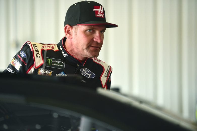 LONG POND, PENNSYLVANIA - MAY 31: Clint Bowyer, driver of the #14 Haas Automation Ford, climbs into his car during practice for the Monster Energy NASCAR Cup Series Pocono 400 at Pocono Raceway on May 31, 2019 in Long Pond, Pennsylvania. (Photo by Jared C. Tilton/Getty Images) | Getty Images