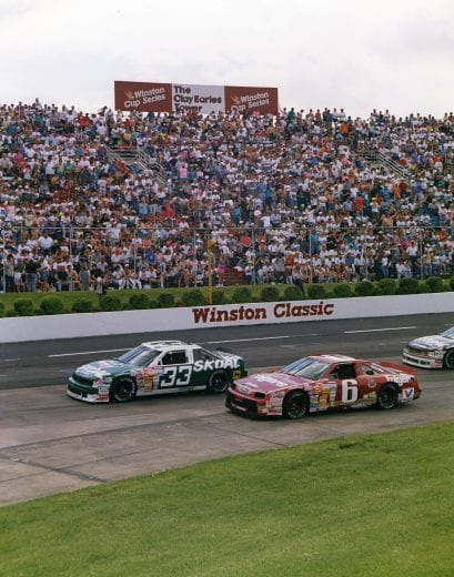 MARTINSVILLE, VA - SEPTEMBER 22, 1991: Harry Gant (No. 33) leads Mark Martin (No. 6) on his way to winning the GoodyÕs 500 NASCAR Cup race at Martinsville Speedway. The win was GantÕs fourth in a row during the latter half of the 1991 season, earning him the nickname ÒMr. September.Ó (Photo by ISC Images & Archives via Getty Images)