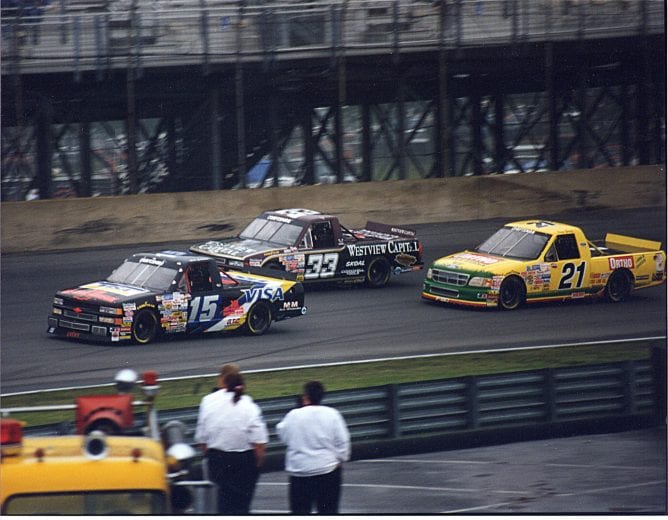1996: NASCAR Truck Series action with Mike Colabucci (No. 15), Harry Gant (No. 33) and Doug George (No. 21). (Photo by ISC Images & Archives via Getty Images)