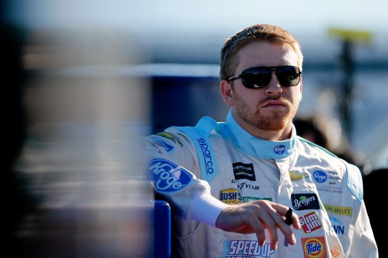 MARTINSVILLE, VA - MARCH 23: Chris Buescher, driver of the #37 Kroger Speed Up Your Cleanup Chevrolet, stands on the grid during qualifying for the Monster Energy NASCAR Cup Series STP 500 at Martinsville Speedway on March 23, 2019 in Martinsville, Virginia. (Photo by Brian Lawdermilk/Getty Images) | Getty Images