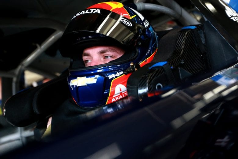 CHARLOTTE, NC - MAY 17:  Alex Bowman, driver of the #88 Axalta Chevrolet, watches on in the garage area during practice for the Monster Energy NASCAR Cup Series All-Star Race at Charlotte Motor Speedway on May 17, 2019 in Charlotte, North Carolina.  (Photo by Sean Gardner/Getty Images) | Getty Images