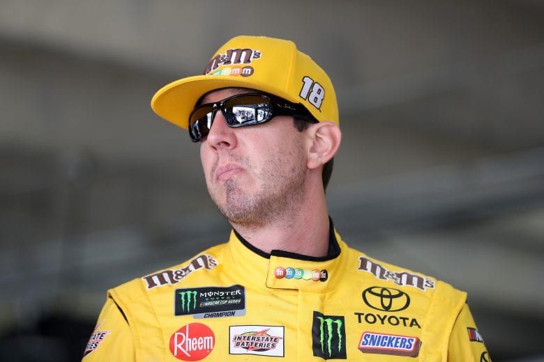 CHARLOTTE, NORTH CAROLINA - MAY 23: Kyle Busch, driver of the #18 M&M's Red White & Blue Toyota, looks on in the garage during practice for the Monster Energy NASCAR Cup Series Coca-Cola 600 at Charlotte Motor Speedway on May 23, 2019 in Charlotte, North Carolina. (Photo by Streeter Lecka/Getty Images) | Getty Images