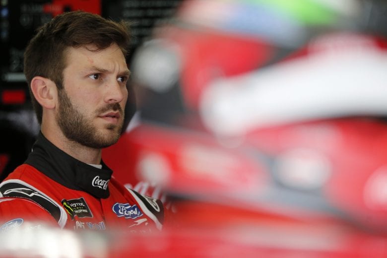CHARLOTTE, NORTH CAROLINA - MAY 23: Daniel Suarez, driver of the #41 Coca-Cola Ford, stands in the garage area during practice for the Monster Energy NASCAR Cup Series Coca-Cola 600 at Charlotte Motor Speedway on May 23, 2019 in Charlotte, North Carolina. (Photo by Brian Lawdermilk/Getty Images) | Getty Images
