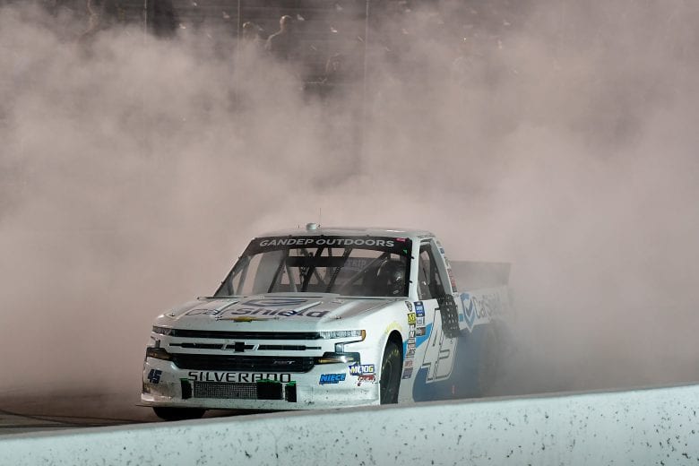 Ross Chastain celebrates with a burnout at World Wide Technology Raceway at Gateway.