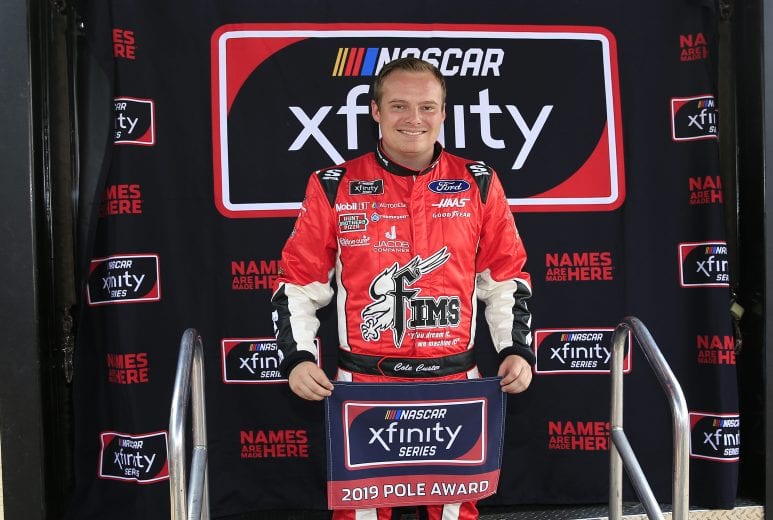 LONG POND, PENNSYLVANIA - JUNE 01: Cole Custer, driver of the #00 FIMS Manufacturing Ford, poses with the Pole Award following qualifying for the NASCAR Xfinity Series Pocono Green 250 at Pocono Raceway on June 01, 2019 in Long Pond, Pennsylvania. (Photo by Chris Trotman/Getty Images) | Getty Images