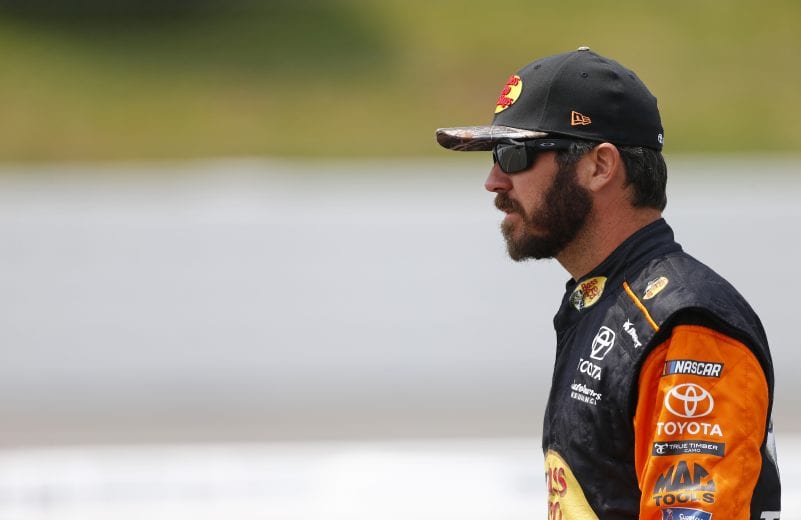 LONG POND, PENNSYLVANIA - JUNE 01: Martin Truex Jr., driver of the #19 Bass Pro Shops Toyota, looks on during qualifying for the Monster Energy NASCAR Cup Series Pocono 400 at Pocono Raceway on June 01, 2019 in Long Pond, Pennsylvania. (Photo by Jonathan Ferrey/Getty Images) | Getty Images