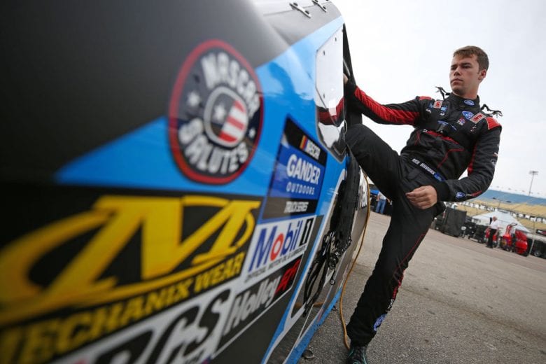NEWTON, IOWA - JUNE 15: Ben Rhodes, driver of the #99 Carolina Nut Ford, gets into his truck during practice for the NASCAR Gander Outdoor Truck Series M&M'S 200 at Iowa Speedway on June 15, 2019 in Newton, Iowa. (Photo by Matt Sullivan/Getty Images) | Getty Images