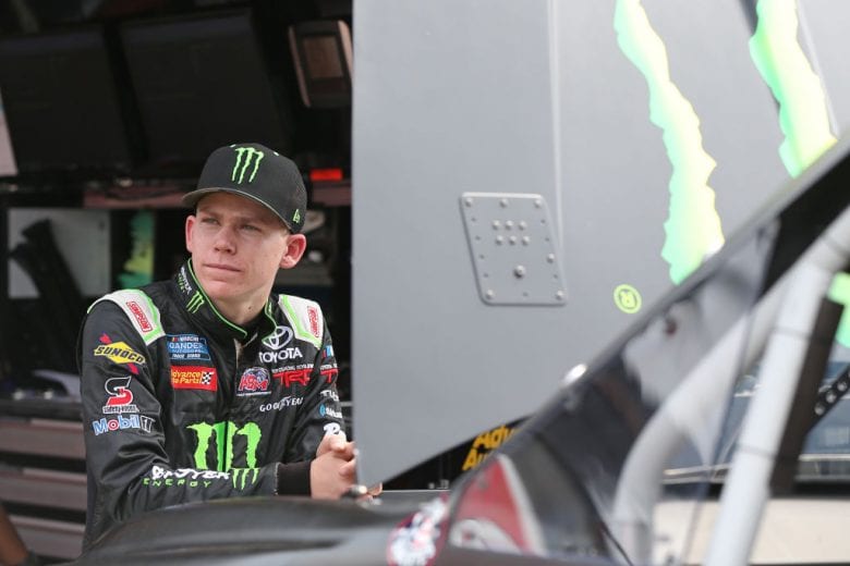 NEWTON, IOWA - JUNE 15: Riley Herbst, driver of the #46 Monster Energy/Advance Auto Parts Toyota, stands by his truck during practice for the NASCAR Gander Outdoor Truck Series M&M'S 200 at Iowa Speedway on June 15, 2019 in Newton, Iowa. (Photo by Matt Sullivan/Getty Images) | Getty Images