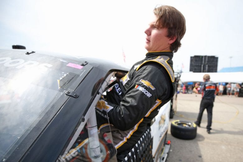 NEWTON, IOWA - JUNE 15: Sheldon Creed, driver of the #2 Chevrolet Accessories Chevrolet, gets into his truck during practice for the NASCAR Gander Outdoor Truck Series M&M'S 200 at Iowa Speedway on June 15, 2019 in Newton, Iowa. (Photo by Matt Sullivan/Getty Images) | Getty Images