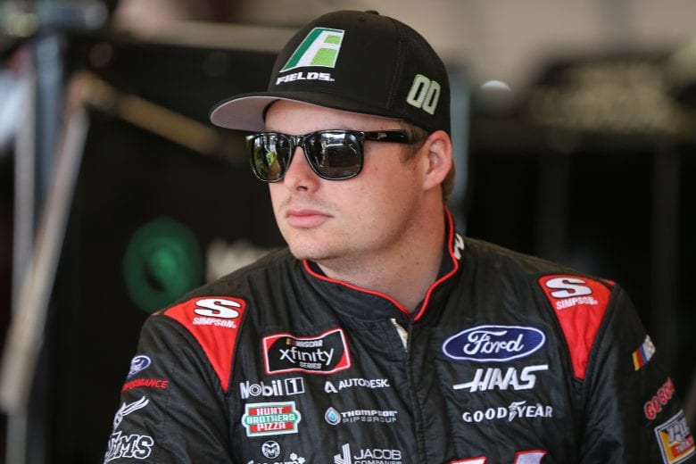 NEWTON, IOWA - JUNE 15: Cole Custer, driver of the #00 FIELDS Ford, stands by his car during practice for the NASCAR Gander Outdoor Truck Series M&M'S 200 at Iowa Speedway on June 15, 2019 in Newton, Iowa. (Photo by Matt Sullivan/Getty Images) | Getty Images