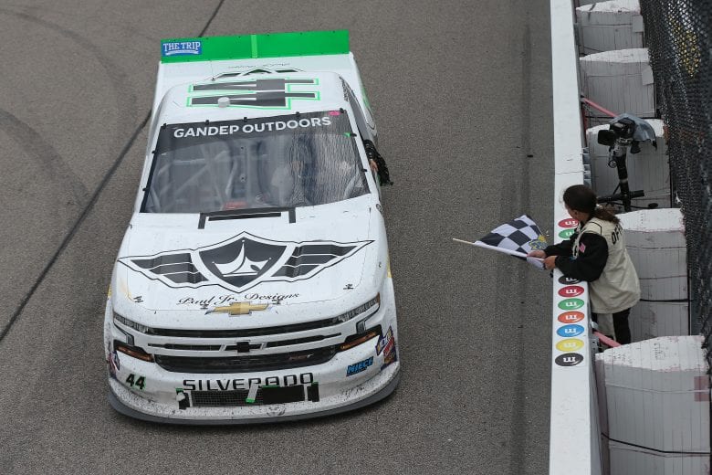 NEWTON, IOWA - JUNE 16: Ross Chastain, driver of the #44 TruNorth/Paul Jr Designs Chevrolet, celebrates with the checkered flag after winning the NASCAR Gander Outdoor Truck Series M&M's 200 Presented by Casey's General Store at Iowa Speedway on June 16, 2019 in Newton, Iowa. (Photo by Matt Sullivan/Getty Images) | Getty Images