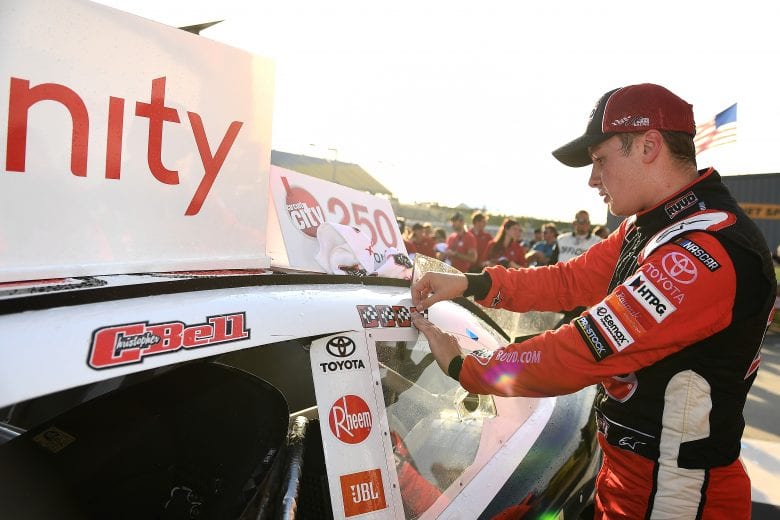 NEWTON, IOWA - JUNE 16: Christopher Bell, driver of the #20 Ruud Toyota, poses with the winner's sticker after the NASCAR Xfinity Series CircuitCity.com 250 Presented by Tamron at Iowa Speedway on June 16, 2019 in Newton, Iowa. (Photo by Stacy Revere/Getty Images) | Getty Images