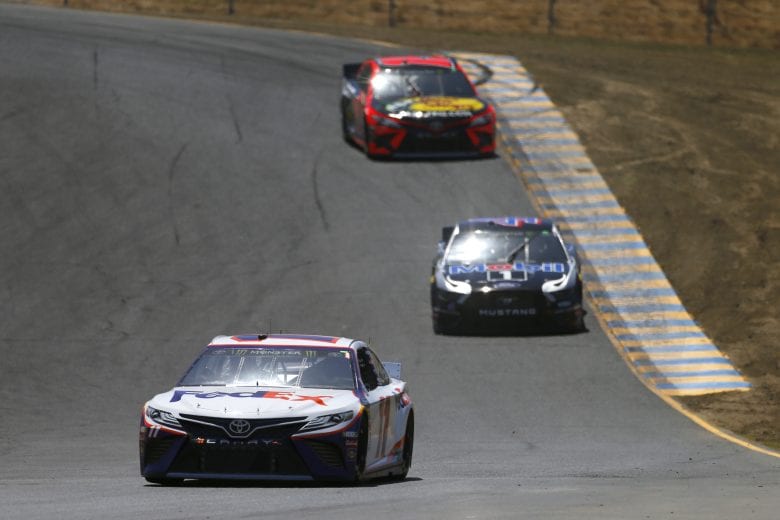 SONOMA, CALIFORNIA - JUNE 21: Denny Hamlin, driver of the #11 FedEx Ground Toyota, leads Kevin Harvick, driver of the #4 Mobil 1 Ford, and Martin Truex Jr., driver of the #19 Bass Pro Shops Toyota, during practice for the Monster Energy NASCAR Cup Series Toyota/Save Mart 350 at Sonoma Raceway on June 21, 2019 in Sonoma, California. (Photo by Jonathan Ferrey/Getty Images) | Getty Images