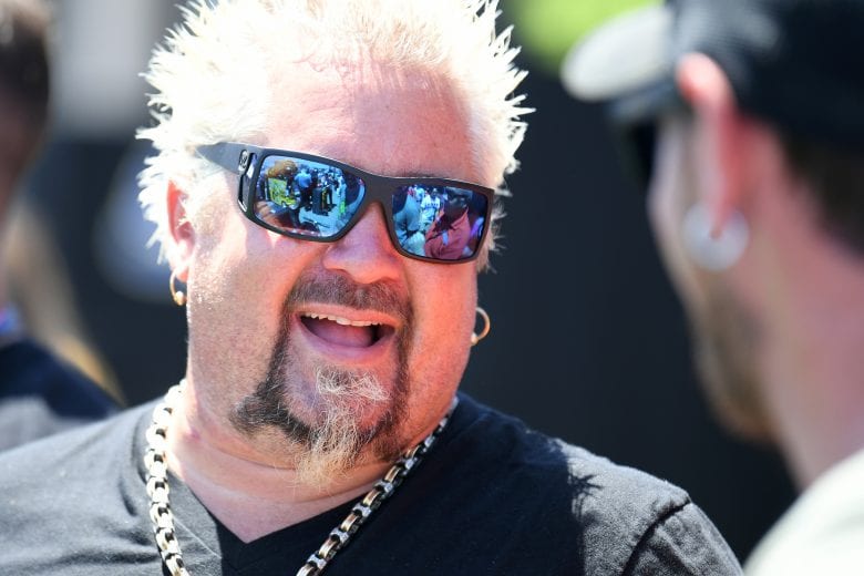 SONOMA, CALIFORNIA - JUNE 22: Celebrity chef Guy Fieri hangs out during qualifying for the Monster Energy NASCAR Cup Series Toyota/Save Mart 350 at Sonoma Raceway on June 22, 2019 in Sonoma, California. (Photo by Robert Reiners/Getty Images) | Getty Images