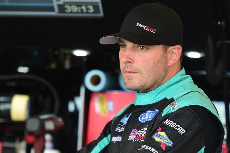 JOLIET, ILLINOIS - JUNE 27: Johnny Sauter, driver of the #13 Tenda Heal Ford, stands in the garage area during practice for the NASCAR Gander Outdoors Truck Series Camping World 225 at Chicagoland Speedway on June 27, 2019 in Joliet, Illinois. (Photo by Jared C. Tilton/Getty Images) | Getty Images
