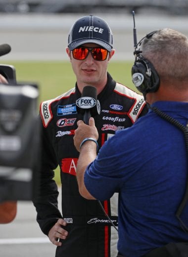 JOLIET, ILLINOIS - JUNE 28: Spencer Davis, driver of the #44 Niece Motorsports Chevrolet, speaks with a reporters before qualifying for the NASCAR Gander Outdoors Truck Series Camping World 225 at Chicagoland Speedway on June 28, 2019 in Joliet, Illinois. (Photo by Jonathan Daniel/Getty Images) | Getty Images