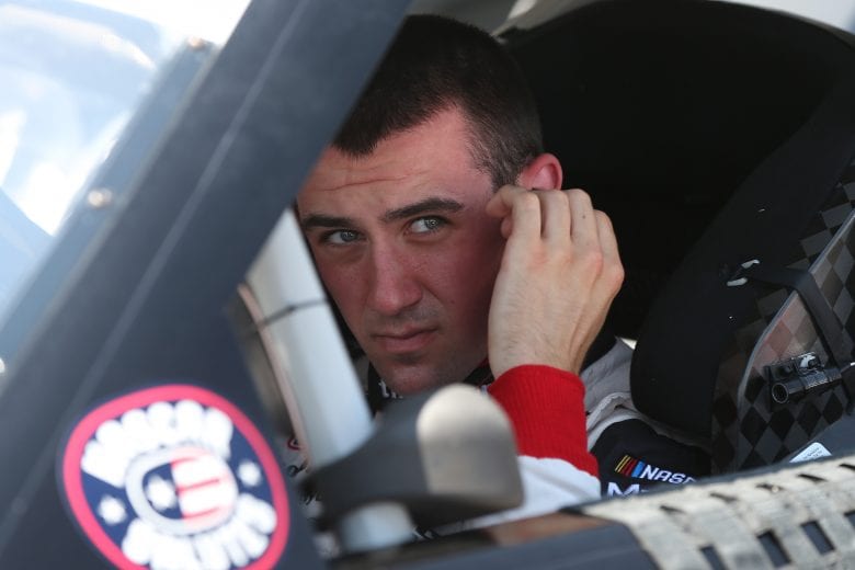 JOLIET, ILLINOIS - JUNE 29: Austin Cindric, driver of the #22 Discount Tire Ford, sits in his car during qualifying for the NASCAR Xfinity Series Camping World 300 at Chicagoland Speedway on June 29, 2019 in Joliet, Illinois. (Photo by Matt Sullivan/Getty Images) | Getty Images