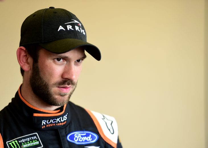 JOLIET, ILLINOIS - JUNE 29: Daniel Suarez, driver of the #41 Ruckus Ford, stands in the garage area during practice for the Monster Energy NASCAR Cup Series Camping World 400 at Chicagoland Speedway on June 29, 2019 in Joliet, Illinois. (Photo by Jared C. Tilton/Getty Images) | Getty Images