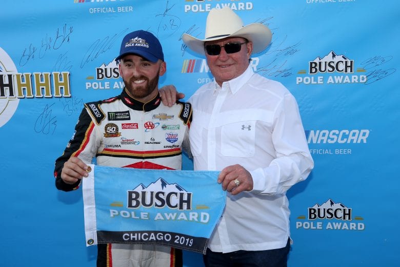 JOLIET, ILLINOIS - JUNE 29: Austin Dillon, driver of the #3 Dow Univar Solutions Chevrolet, poses with his grandfather and team owner, Richard Childress, after posting the quickest lap during qualifying for the Monster Energy NASCAR Cup Series Camping World 400 at Chicagoland Speedway on June 29, 2019 in Joliet, Illinois. (Photo by Jonathan Daniel/Getty Images) | Getty Images