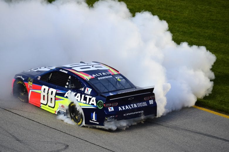 JOLIET, ILLINOIS - JUNE 30: Alex Bowman, driver of the #88 Axalta Chevrolet, celebrates with a burnout after winning the Monster Energy NASCAR Cup Series Camping World 400 at Chicagoland Speedway on June 30, 2019 in Joliet, Illinois. (Photo by Jared C. Tilton/Getty Images) | Getty Images