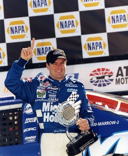 HAMPTON, GA — November 11, 2000:  Jerry Nadeau celebrates the only NASCAR Cup win of his career in victory lane at Atlanta Motor Speedway.  Nadeau led 155 of 325 laps in the NAPA 500, driving the Michael Holigan.com Chevrolet for car owner Rick Hendrick.  (Photo by ISC Images & Archives via Getty Images)
