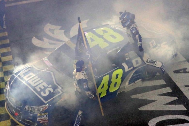 HOMESTEAD, FL - NOVEMBER 20:  Jimmie Johnson, driver of the #48 Lowe's Chevrolet, celebrates after winning the NASCAR Sprint Cup Series Ford EcoBoost 400 and the 2016 NASCAR Sprint Cup Series Championship at Homestead-Miami Speedway on November 20, 2016 in Homestead, Florida. Johnson wins a record-tying 7th NASCAR title.  (Photo by Sean Gardner/NASCAR via Getty Images)