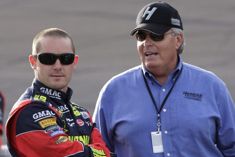 AVONDALE, AZ - NOVEMBER 09:  Casey Mears, driver of the #25 National Guard/GMAC Chevrolet, talks with team owner, Rick Hendrick during qualifying for the NASCAR Nextel Cup Series Checker Auto Parts 500 at Phoenix International Raceway on November 9, 2007 in Avondale, Arizona.  (Photo by John Harrelson/Getty Images for NASCAR) | Getty Images