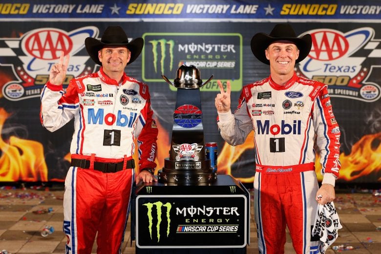 FORT WORTH, TX - NOVEMBER 05:  Kevin Harvick (R), driver of the #4 Mobil 1 Ford, and his crew chief, Rodney Childers, pose with the trophy in Victory Lane after winning the Monster Energy NASCAR Cup Series AAA Texas 500 at Texas Motor Speedway on November 5, 2017 in Fort Worth, Texas.  (Photo by Brian Lawdermilk/Getty Images) | Getty Images