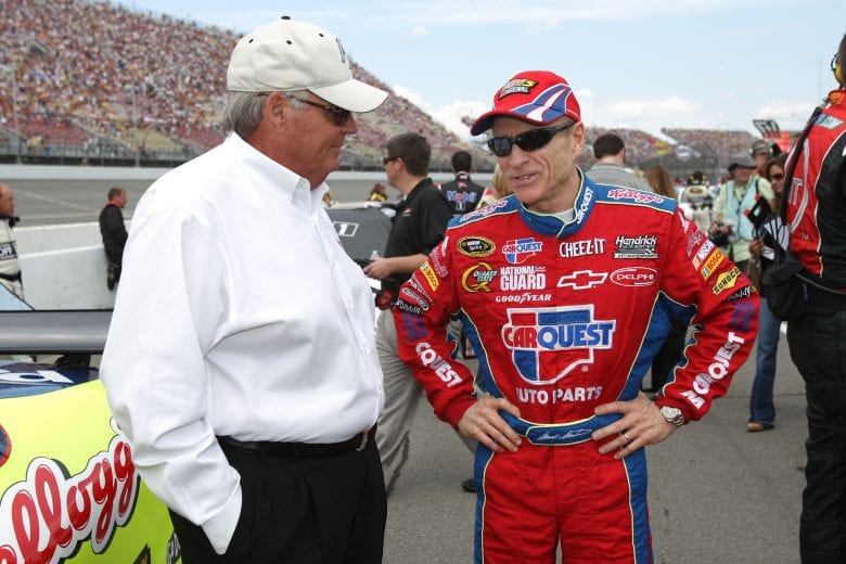 BROOKLYN, MI - JUNE 14:(L-R) Team Owner Rick Hendrick speaks with Mark Martin, driver of the #5 CARQUEST/Kellogg's Chevrolet, during the NASCAR Sprint Cup Series LifeLock 400 at Michigan International Speedway on June 14, 2009 in Brooklyn, Michigan.  (Photo by Ezra Shaw/Getty Images) | Getty Images