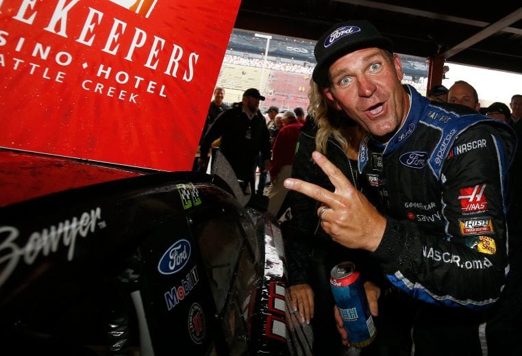 BROOKLYN, MI - JUNE 10: Clint Bowyer, driver of the #14 Haas 30 Years of the VF1 Ford, poses with the winner's sticker after the Monster Energy NASCAR Cup Series FireKeepers Casino 400 at Michigan International Speedway on June 10, 2018 in Brooklyn, Michigan. (Photo by Jeff Zelevansky/Getty Images) | Getty Images