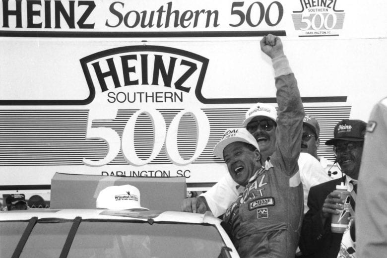 DARLINGTON, SC - SEPTEMBER 1, 1991: Harry Gant climbs from his Leo Jackson Oldsmobile after winning the Heinz Southern 500 at Darlington. Gant led 152 of the 367 laps. (Photo by ISC Archives via Getty Images)