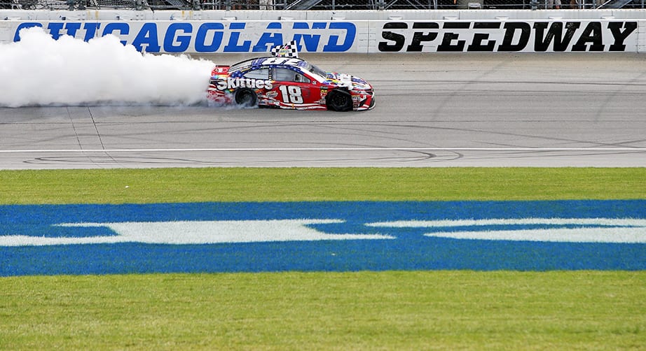 JOLIET, IL - JULY 01:  Kyle Busch, driver of the #18 Skittles Red White & Blue Toyota, celebrates with a burnout after winning the Monster Energy NASCAR Cup Series Overton's 400 at Chicagoland Speedway on July 1, 2018 in Joliet, Illinois.  (Photo by Dylan Buell/Getty Images) | Getty Images