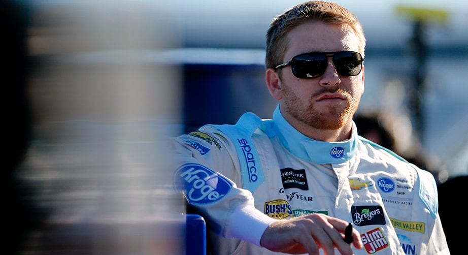 MARTINSVILLE, VA - MARCH 23:  Chris Buescher, driver of the #37 Kroger Speed Up Your Cleanup Chevrolet, stands on the grid during qualifying for the Monster Energy NASCAR Cup Series STP 500 at Martinsville Speedway on March 23, 2019 in Martinsville, Virginia.  (Photo by Brian Lawdermilk/Getty Images) | Getty Images