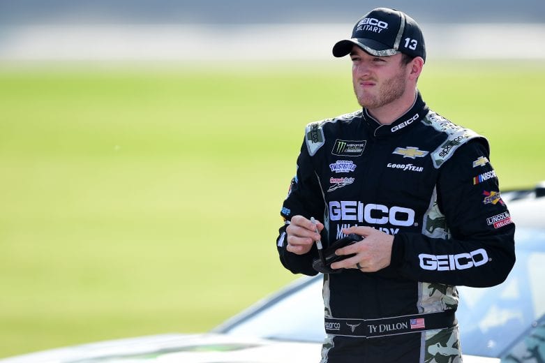 JOLIET, ILLINOIS - JUNE 29: Ty Dillon, driver of the #13 GEICO Military Chevrolet, stands on the grid during qualifying for the Monster Energy NASCAR Cup Series Camping World 400 at Chicagoland Speedway on June 29, 2019 in Joliet, Illinois. (Photo by Jared C. Tilton/Getty Images) | Getty Images