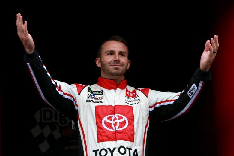 KANSAS CITY, KS - MAY 11: Matt DiBenedetto, driver of the #95 Digital Momentum/Hubspot Toyota, waves to fans during the pre-race ceremonies of the Monster Energy NASCAR Cup Series Digital Ally 400 at Kansas Speedway on May 11, 2019 in Kansas City, Kansas. (Photo by Sean Gardner/Getty Images) | Getty Images