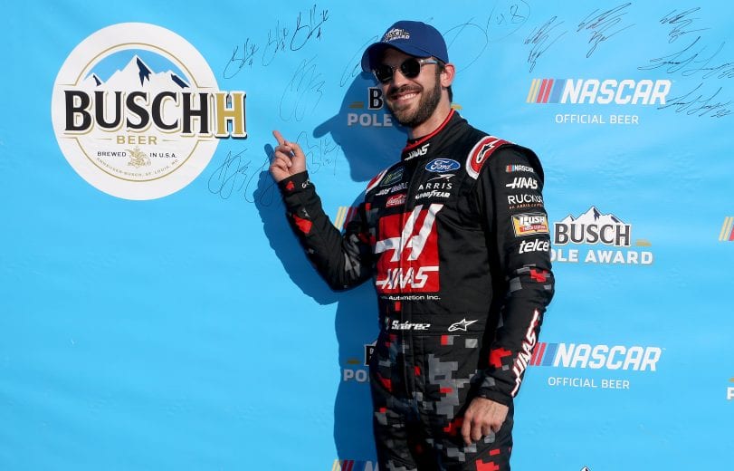 SPARTA, KENTUCKY - JULY 12: Daniel Suarez, driver of the #41 Haas Automation Ford, celebrates with the Busch Pole Award after qualifying for the Monster Energy NASCAR Cup Series Quaker State 400 Presented by Walmart at Kentucky Speedway on July 12, 2019 in Sparta, Kentucky. (Photo by Brian Lawdermilk/Getty Images) | Getty Images