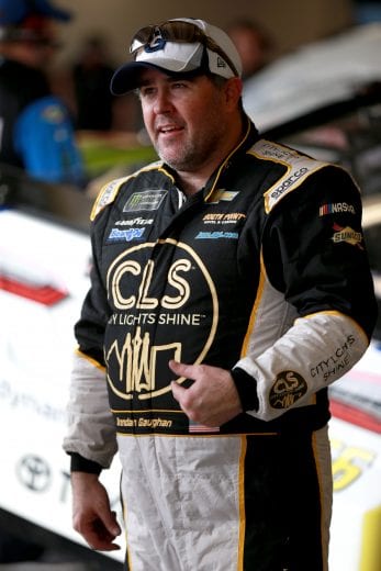 DAYTONA BEACH, FL - FEBRUARY 09: Brendan Gaughan, driver of the #62 Beard Oil Distributing/South Point Chevrolet, stands in the garage area during practice for the Monster Energy NASCAR Cup Series 61st Annual Daytona 500 at Daytona International Speedway on February 9, 2019 in Daytona Beach, Florida. (Photo by Sean Gardner/Getty Images) | Getty Images