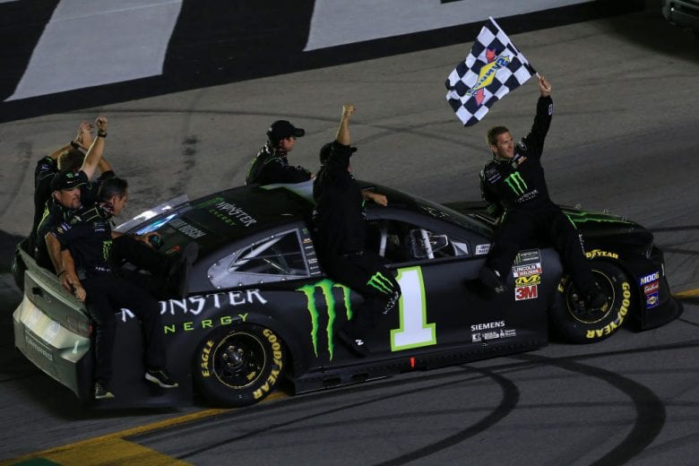 SPARTA, KENTUCKY - JULY 13: Kurt Busch, driver of the #1 Monster Energy Chevrolet, celebrates with his crew members after winning the Monster Energy NASCAR Cup Series Quaker State 400 Presented by Walmart at Kentucky Speedway on July 13, 2019 in Sparta, Kentucky. (Photo by Daniel Shirey/Getty Images)