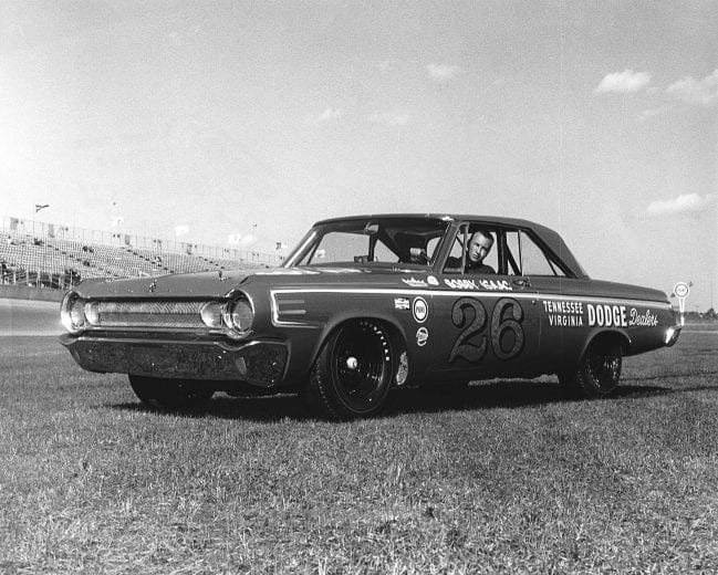 DAYTONA BEACH, FL — 1964:  Bobby Isaac got the biggest break in his racing career at the beginning of the year when he was tapped to drive a factory Dodge built and owned by Ray Nichels.  Isaac scored the first win of his NASCAR Cup career at Daytona International Speedway in February by taking one of the twin qualifying races for the Daytona 500, as those races were Cup points-paying events at that time.  Isaac went on to finish 15th in the Daytona 500, but in July came home second in the Firecracker 400, being passed by winner A. J. Foyt coming down to the checkered flag.  (Photo by ISC Images & Archives via Getty Images)