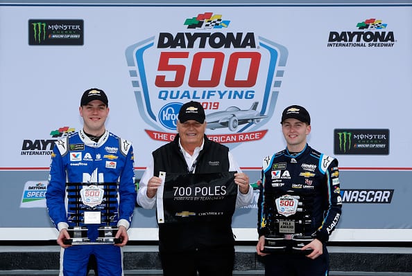 DAYTONA BEACH, FL - FEBRUARY 10: Alex Bowman, driver of the #88 Nationwide Chevrolet, team owner Rick Hendrick and William Byron, driver of the #24 Axalta Chevrolet, celebrate after winning their 700th pole award during qualifying for the Monster Energy NASCAR Cup Series 61st Annual Daytona 500 at Daytona International Speedway on February 10, 2019 in Daytona Beach, Florida. (Photo by Jonathan Ferrey/Getty Images) | Getty Images