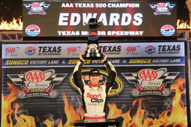 FORT WORTH, TX - NOVEMBER 06: Carl Edwards, driver of the #19 Sport Clips Toyota, poses in Victory Lane after winning the rain-shortened NASCAR Sprint Cup Series AAA Texas 500 at Texas Motor Speedway on November 6, 2016 in Fort Worth, Texas. (Photo by Jerry Markland/Getty Images) | Getty Images