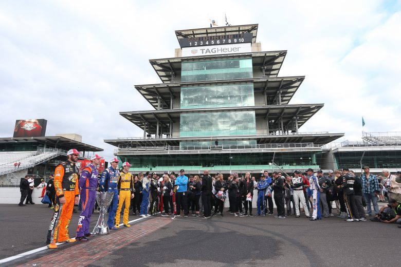 INDIANAPOLIS, IN - SEPTEMBER 10:  Martin Truex Jr., driver of the #78 Auto-Owners Insurance Toyota, Denny Hamlin, driver of the #11 FedEx Possibilities Toyota, Kyle Busch, driver of the #18 M&M's Caramel Toyota, Erik Jones, driver of the #20 buyatoyota.com Toyota, pose for a photo with the Monster Energy NASCAR Cup Series trophy after making the playoffs following the Monster Energy NASCAR Cup Series Big Machine Vodka 400 at the Brickyard at Indianapolis Motor Speedway on September 10, 2018 in Indianapolis, Indiana.  (Photo by Matt Sullivan/Getty Images) | Getty Images