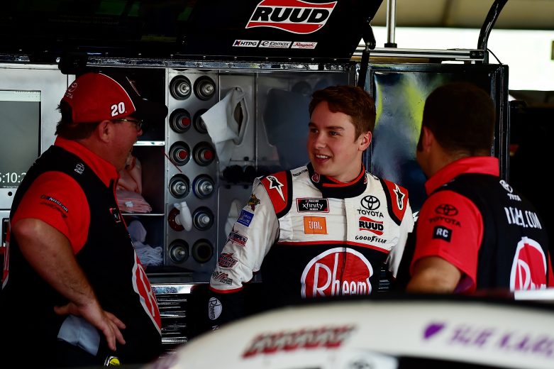 NEWTON, IA - JULY 26: Christopher Bell, driver of the #20 Rheem Toyota, talks with crew member in the garage during practice for the NASCAR Xfinity Series U.S. Cellular 250 at Iowa Speedway on July 26, 2019 in Newton, Iowa. (Photo by Jeff Curry/Getty Images) | Getty Images