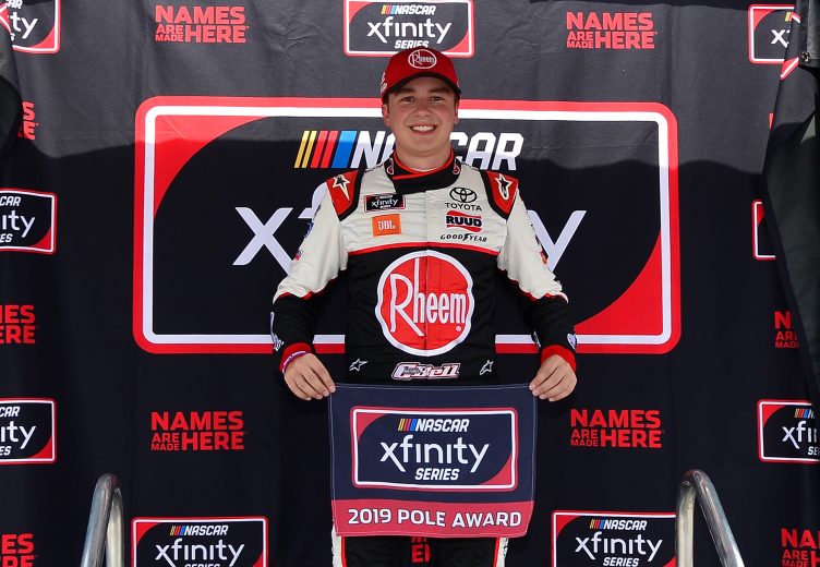 NEWTON, IA - JULY 27: Christopher Bell, driver of the #20 Rheem Toyota, poses with the pole award after posting the fastest lap during qualifying for the NASCAR Xfinity Series U.S. Cellular 250 at Iowa Speedway on July 27, 2019 in Newton, Iowa. (Photo by Jeff Curry/Getty Images) | Getty Images