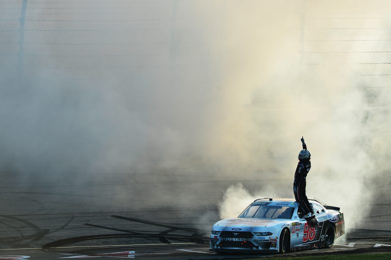 NEWTON, IA - JULY 27: Chase Briscoe, driver of the #98 Ford Performance Ford, celebrates with a burn out after winning the NASCAR Xfinity Series U.S. Cellular 250 at Iowa Speedway on July 27, 2019 in Newton, Iowa. (Photo by Jeff Curry/Getty Images) | Getty Images