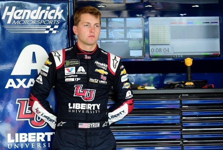 JOLIET, ILLINOIS - JUNE 29: William Byron, driver of the #24 Liberty University Chevrolet, stands in the garage area during practice for the Monster Energy NASCAR Cup Series Camping World 400 at Chicagoland Speedway on June 29, 2019 in Joliet, Illinois. (Photo by Jared C. Tilton/Getty Images) | Getty Images